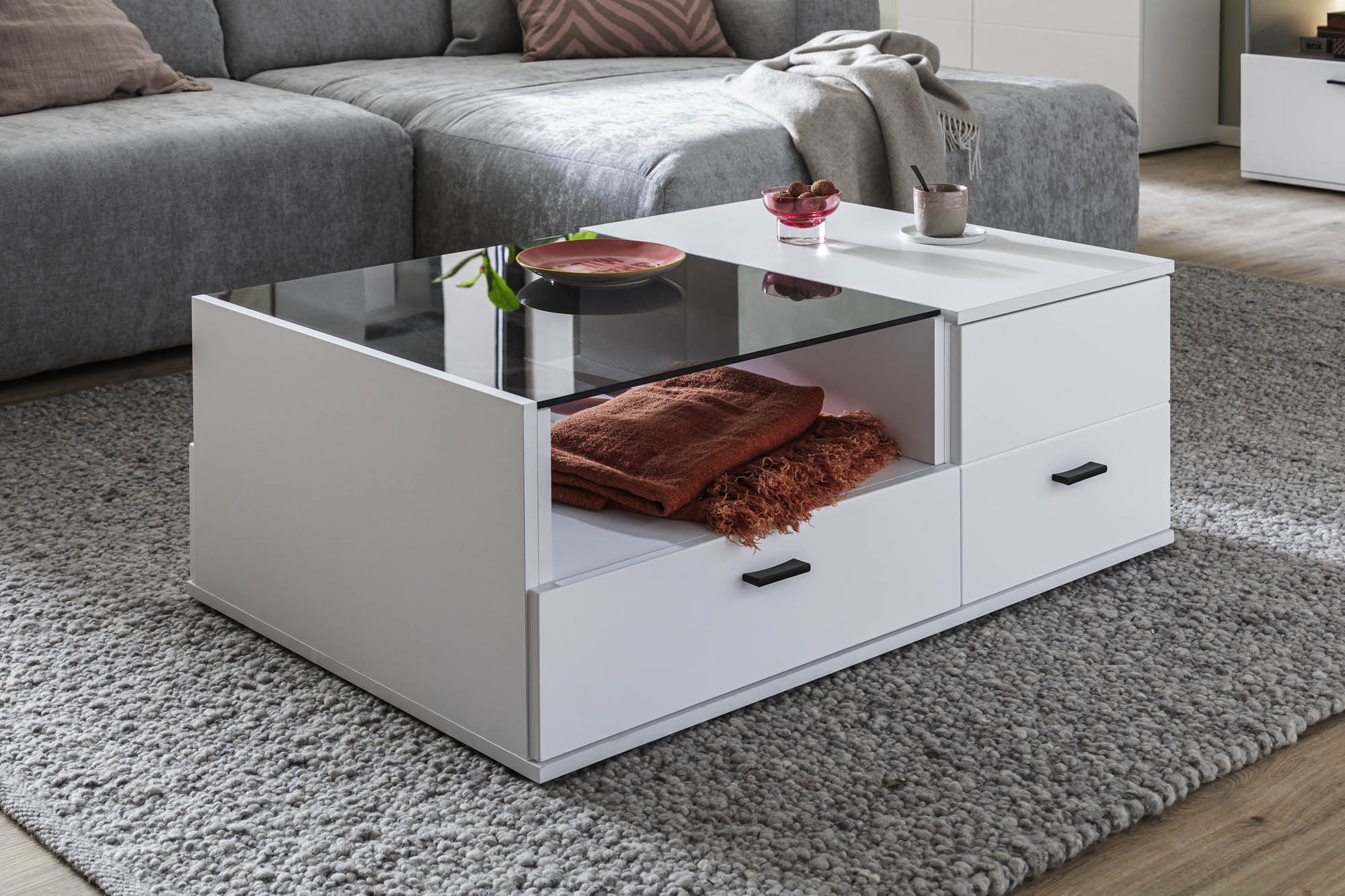 Couchtisch alpinweiß Dekor - mit 1 Tür, 1 Schubkasten, 1 offenen Fach und Glas,  -  Rivalee